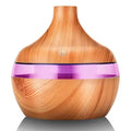 Diffuseur d'huiles essentielles et humidificateur ultrasonique à effet bois – Éclairage LED 7 couleurs avec télécommande